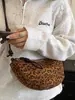 Bolsa feminina estilosa de alta qualidade Shuai Mi Jia, grande capacidade, nova bolsa transversal retrô de nicho outono 2026, bolsa de bolinho