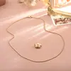 Collar Colgante Pequeña Flor Zirconio Metal Cepillado de Gama Alta para Mujer 2026 Nueva Moda Cadena Clavicular de Temperamento para el Trabajo