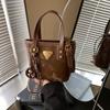 Bolso Cubo de Mano Informal de Moda Transfronterizo para Mujer 2026 Invierno Nuevo Estilo Coreano Bolso de Hombro Versátil Bolso de Alta Gama para Mujer
