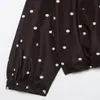 Comercio exterior transfronterizo al por mayor para mujer otoño moda europea y americana casual holgada chaqueta negra con puntos de lunares con cremallera de manga larga