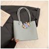 Bolsa Tote de Grande Capacidade Estilo Coreano Feminina Lançamento Moda Versátil Bolsa de Mão Bolsa de Ombro Única Simples de Nicho para Mulheres 2025 Primavera