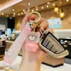 Llavero de oso de color gelatina de dibujos animados creativo con esmalte, muñeco de personalidad, colgante estilo Ins para bolsa, regalo pequeño al por mayor