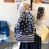 Mochila feminina transfronteiriça 2026 estilo coreano, design de bolinhas, fofa, adequada para alunos do ensino fundamental e médio