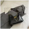 Bolsa de mão de nicho estilo coreano para mulheres, nova coleção outono/inverno 2026, bolsa tiracolo de alta qualidade para o dia a dia, bolsa de ombro versátil e moderna, bolsa de axila