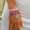 Pulsera apilada de cuentas de semillas con colgante de borla de cuentas bohemia más vendida transfronteriza con un diseño geométrico de alta gama