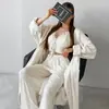 Nuevos pijamas de punto elástico acanalado con encaje, cuello halter, tirantes y pantalones largos de otoño e invierno, para mujer, ropa de casa, transfronterizos europeos y americanos.