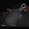 Bolsa para Llave de Coche de Cuero Genuino Cubierta Protectora Hebilla Decoración Cremallera Universal Control Remoto Inteligente Hombres y Mujeres Estilo Nuevo Personalización Personalizada