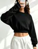 2026 Primavera e Outono Feminino Emagrecedor Menina Picante Gola Redonda Manga Longa Top Versátil para o Trabalho Curto Top Atacado