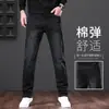 Jeans de alta qualidade 2026 novo modelo para homens, calças casuais elásticas para primavera e outono, corte reto solto, calças de primavera para homens de meia-idade