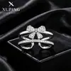 Anillo abierto de doble capa con lazo Xuping estilo ins de aleación de cobre al por mayor, joyería elegante dulce y de lujo ligero para mujer
