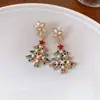 Pendientes de árbol de Navidad con estrella de circonita y aguja de plata, ligeros, lujosos, de alta gama, fáciles de combinar, con un dulce temperamento navideño para mujer.