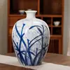 Jingdezhen Florero Cerámico Azul y Blanco Pintado en Oro Estilo Chino Nuevo Flor de Orquídea Pintada a Mano Florero Decorativo Adornos para Arreglos Florales del Hogar Venta al por Mayor