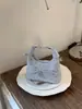 Bolsas de Nicho Super Populares para Primavera e Verão para Mulheres 2026 Nova Moda Versátil Bolsa de Ombro Transversal Bolsa de Mão Pequena Exquisita