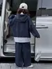 Conjunto de Ropa para Niñas Primavera y Otoño 2026 Estilo Nuevo Sudadera con Capucha Falsa de Dos Piezas y Pantalones de Pierna Ancha para Niños Mayores, Moderno y Genial