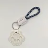 Novo pingente memorial criativo para guardar pelos de pet, porta-cartão de acesso à porta anti-perda, pingente de chaveiro de pata de cachorro