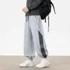 Pantalones de Hombre Otoño 2026 Nuevos de Corte Holgado tipo Jogger Deportivos Versátiles de Pierna Ancha Casuales para Adolescentes