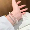 Pulseira Estrela Cadente Cintilante de Zircônia da Moda para Mulheres, Pulseira Raquete de Tênis, Sensação de Luxo Leve de Alta Qualidade, Empilhável com Fileira de Diamantes