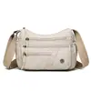Nova bolsa de dumpling de grande capacidade com múltiplos compartimentos para comércio exterior transfronteiriço, bolsa de ombro casual versátil, bolsa transversal simples para sair