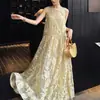 Escondite a Medio Camino de la MontañaSeda Brocada Hilo de Oro Hecho a Mano Estampado Calado Vestido de Seda Estilo Nuevo Verano 2026 Vestido Elegante
