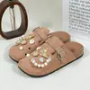 Nuevos zapatos Birkenstock 2026, exclusivamente para ventas transfronterizas, sin cordones, moda dulce y genial, zuecos dorados con anillo de mariposa