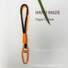 Lanyard para Teléfono Móvil Trenzado Súper Bonito Llavero para Mujer Elegante de Muñeca Material DIY Antirrobo