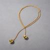 Collar largo de concha redonda doble multiuso para mujer, joyería de diseño original simple de alta gama de nicho europeo y americano, 2024