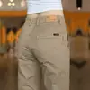 Pantalones Casuales de Lujo Ligero al por Mayor para Hombre Primavera Verano 2026 Nuevos Elásticos Transpirables Pantalones Largos Rectos para Hombre de Negocios