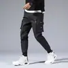 Pantalones cruzados nuevos para hombre, estilo coreano, modernos, corte holgado, estilo ins para estudiantes, pantalones cargo chic casual cortos, marca de moda, con puños en los tobillos