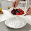 Bandeja para vaporera vidriada de color cerámico, minimalista y porosa; plato redondo creativo para dumplings para uso doméstico; bandeja escurridora de frutas y verduras; plato de servir creativo