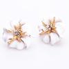 Pendientes de botón con personalidad de estrella de mar, estilo bohemio coreano, de metal, con flores dulces y ricas, a la moda