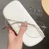 Nuevas Gafas Ultraligeras Estilo Rostro Desnudo Celebridad de Internet Ultraligeras Titanio Puro Deseo Moda Marco de Titanio Sin Montura Fabricante de Danyang Venta al por Mayor