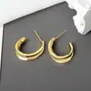 Dz Pendientes de botón simples, lisos, curvos y retorcidos para mujer, nicho, versátiles, de alta gama, estilo minimalista, joyería para orejas con temperamento, venta al por mayor