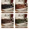 Sofá de cuero negro tipo panda de lujo ligero estilo italiano para salas de estar pequeñas, sofá de arte en cuero al aceite y cera de línea recta, diseño simple