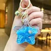Llavero Creativo Serie Océano Relleno de Aceite Pez Payaso Estrella de Mar Pez Pequeño Colgante de Bolso Decoración de Llavero