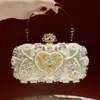 Moda nova transfronteiriça combinando bolsa de mão pequena com bordado de cheongsam incrustada com strass bolsa de mão de alta qualidade bolsa de banquete requintada versátil