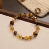 Pulsera de Piedra Ojo de Tigre Natural Color Tierra Maillard Pulsera de Otoño e Invierno Elástica Lujo Ligero Nicho Versátil Joyería para Mano Venta al por Mayor