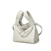 Bolso de mano de cuero genuino de moda coreano de nicho, modelo popular nuevo de comercio exterior transfronterizo 2026, bolso bandolera simple de mano