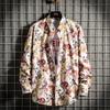 Comercio exterior 2023 primavera nueva camisa de manga larga con flores para hombre, camisa de manga larga informal con estampado de moda, venta al por mayor de fábrica