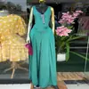 Conjunto de Roupas Femininas Transfronteiriças Europeias e Americanas Primavera 2026 Novo Estilo Elegante Cor Sólida Decote V Sem Mangas Top Calça de Cintura Alta Wide Leg