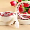 Cinta de papel de enmascarar 18 mm * 18 m temperatura normal costura sin residuo de pegamento se puede escribir, decorar, pintar papel de enmascarar, papel de enmascarar
