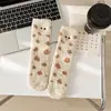 Meias de veludo coral femininas de inverno espessadas sem fiapos para casa meias de dormir femininas com bordado de rosto sorridente de desenho animado fofo atacado