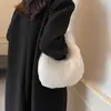 Bolsa de Veludo Acolchoada Feminina Grande Capacidade 2025 Nova Outono e Inverno Bolsa de Mão Versátil Estilo Estrangeiro de Alto Nível Bolsa Peluda