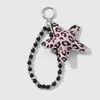 Nuevo Estilo Miu Dulce y Fresco Alto Valor Cristal Imitación Perlas Cuero Estampado Leopardo Estrella Mariposa Llavero DIY