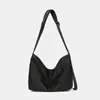 Bolsa Transversal de Lona Casual Estilo Japonês para Mulheres 2025 Nova Simples de Grande Capacidade Bolsa de Ombro Design de Nicho Bolsa para o Dia a Dia
