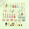 Mezcla 40 Dibujos Animados Europeos y Americanos de Goteo de Aceite Instrumentos Musicales Guitarra Piano Tono Aleación Colgante Pulsera DIY Accesorios de Joyería