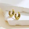 Aretes nuevos de circón aretes color luz lujo geométrico triángulo aretes europeos y americanos aretes de moda exquisitos venta al por mayor