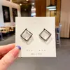 Pendientes combinables puesto de mercado nocturno al por mayor Corea del Sur pendientes explosivos simples diseño de nicho femenino pendientes de moda con temperamento