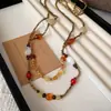 Conjunto de tobillera y collar bohemio de cuentas de cristal multicapa, una cadena para suéter lujosa y elegante, perfecta para vacaciones y versátil para cualquier atuendo