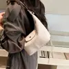 Bolso bandolera moda mujer un solo hombro sensación viajero nuevo tejido gran capacidad bolso versión coreana 2026 casual bola de masa