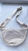 Vendas Diretas de Fábrica Verão 2025 Dopamina Cor Pura Nylon Impermeável Transversal Pequena Bolsa de Pano para Mulheres U Família Mesmo Estilo Bolsa Dumpling